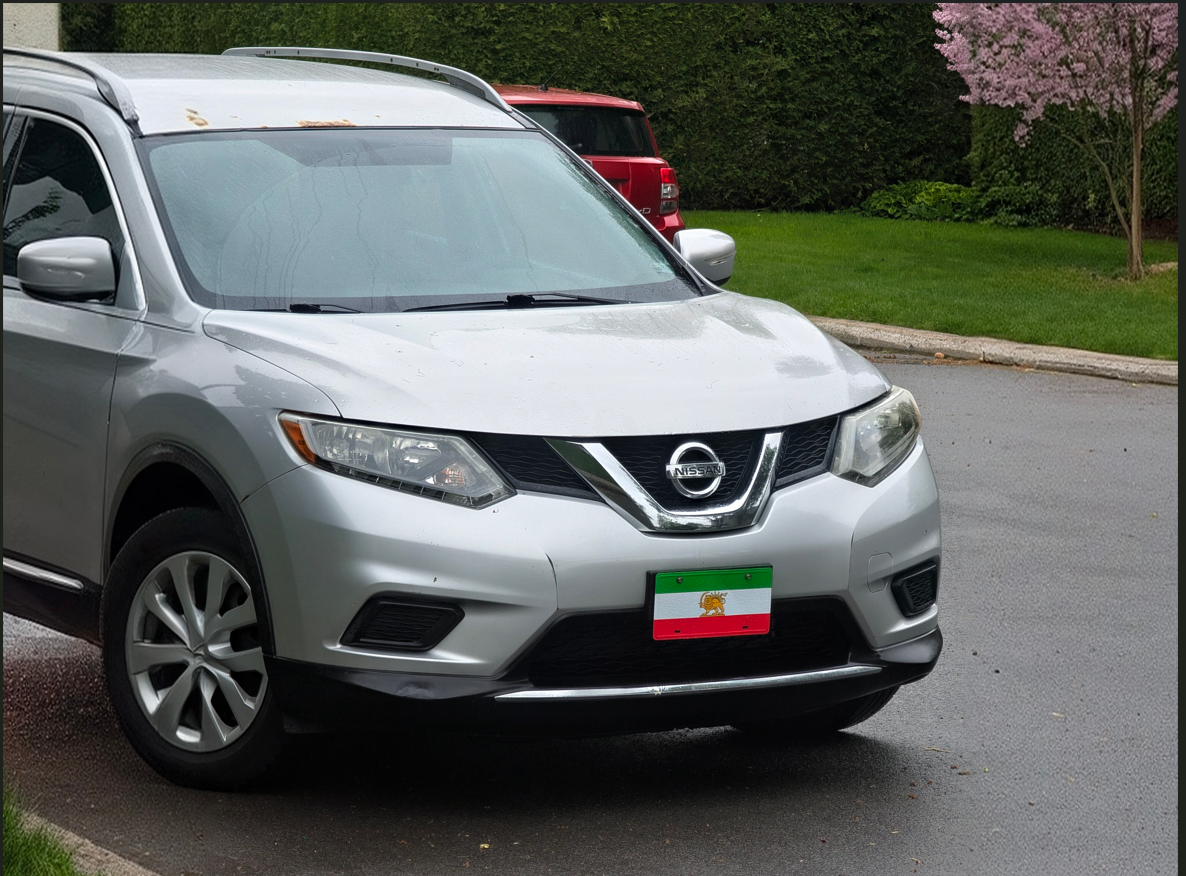 Lion and Sun license plate displayed on car  Persian heritage