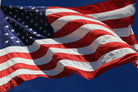 3x5 American Flag flying on a pole outdoors
